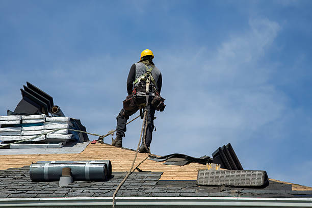 Professional Roof Replacement technician working in Rochester, IN